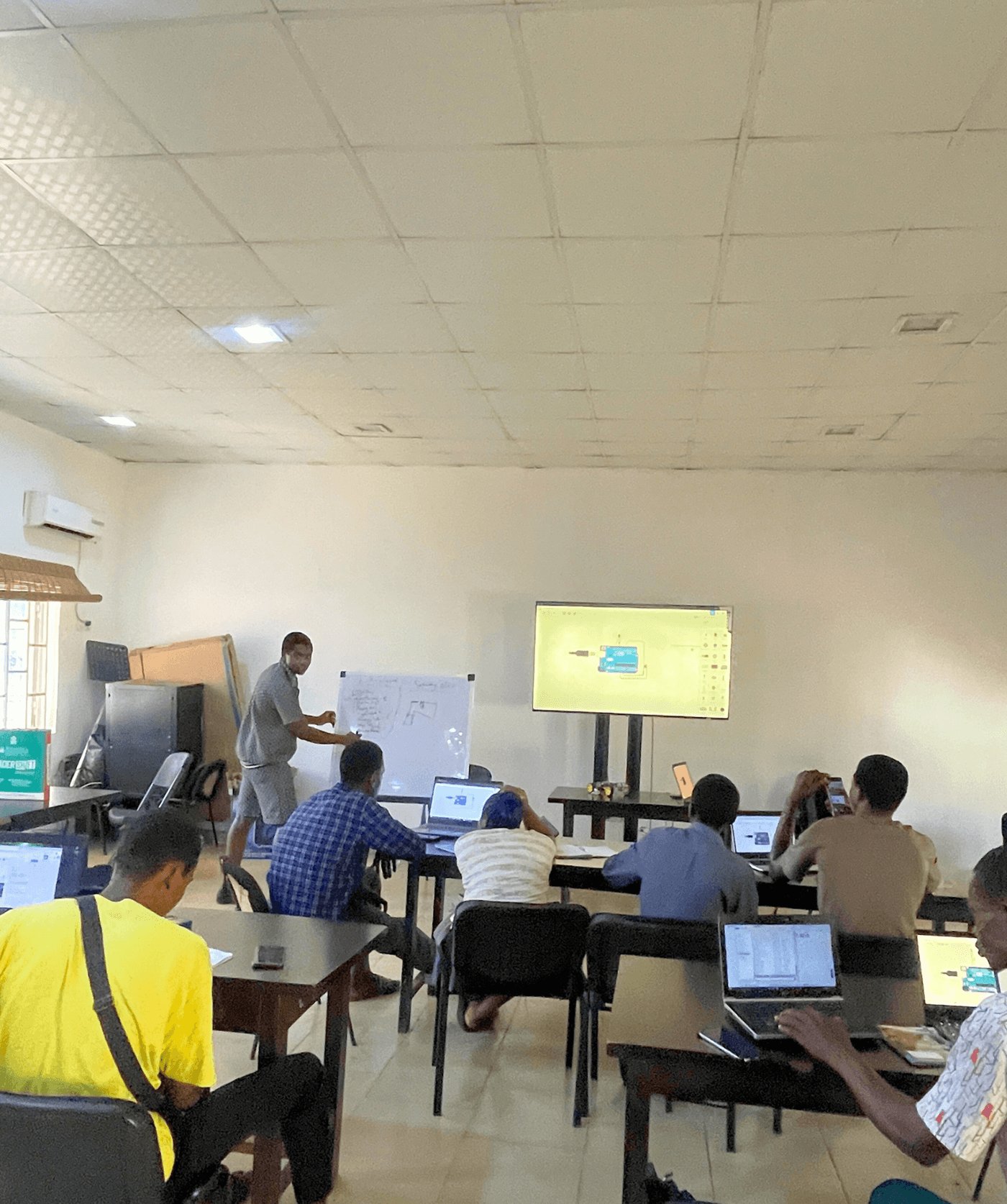 Members working at benches during an open lab session
